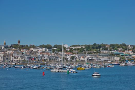 ST. PETER PORT, GUERNSEY, UK - AUGUST 16, 2017: Scenic view of a bay in St. Peter Port in Guernsey, Channel Islands, UK.