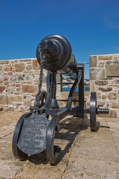 ST. PETER PORT, GUERNSEY, UK - AUGUST 16, 2017: Traversing Carriage Cannon at Castle Cornet in St Peter Port, Guernsey, UK.