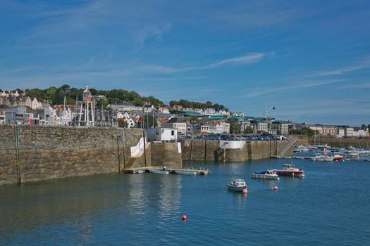 ST. PETER PORT, GUERNSEY, UK - AUGUST 16, 2017: Scenic view of a bay in St. Peter Port in Guernsey, Channel Islands, UK.