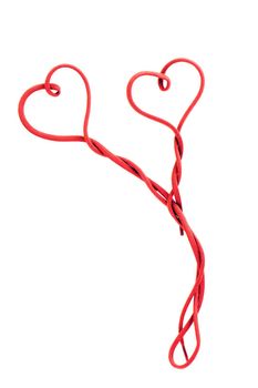 red shoe lace in a shape of two hearts