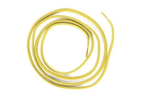 yellow shoe lace against white background