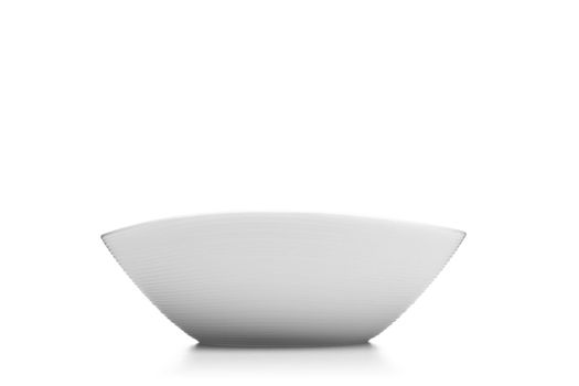 empty white bowl against white background