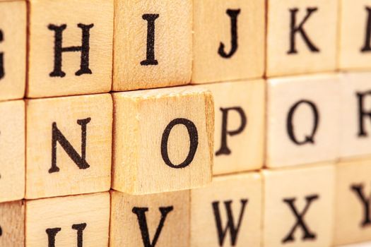 latin alphabet letters on wooden cubes