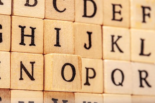 latin alphabet letters on wooden cubes