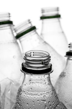 group of smashed empty plastic bottles, isolated on white background