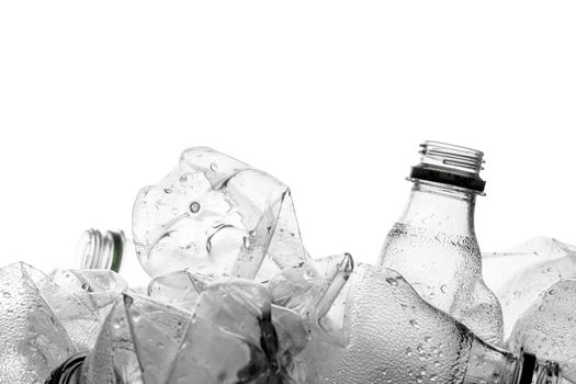 group of smashed empty plastic bottles, isolated on white background