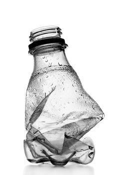 smashed empty plastic bottle, isolated on white background
