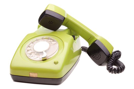 Green telephone retro style on white background. Vintage phone handset receiver.