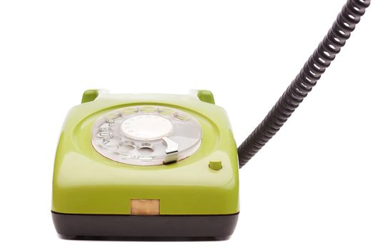 Green telephone retro style on white background. Vintage phone handset receiver.