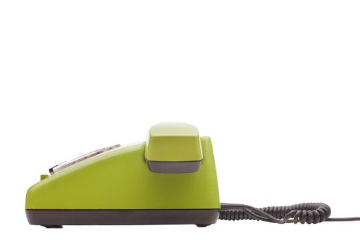 Green telephone retro style on white background. Vintage phone handset receiver.