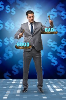 Businessman choosing between good and bad