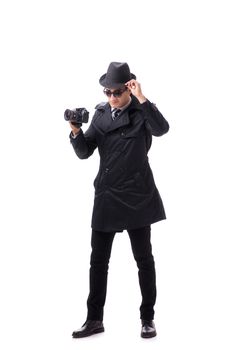 Spy with camera taking pictures isolated on white