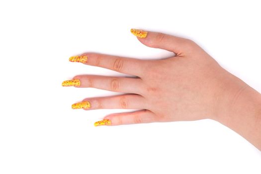 young girls hand with nailart on white