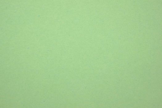 A dense industrial sheet of paper with a textured surface