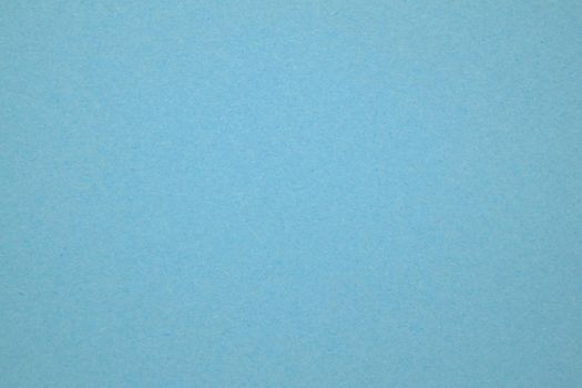 A dense industrial sheet of paper with a textured surface