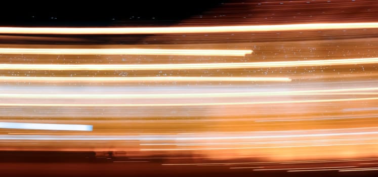Abstract light trails on the dark background