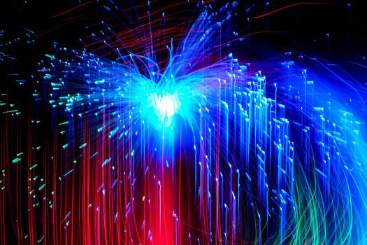 Abstract motion curved lights on dark background
