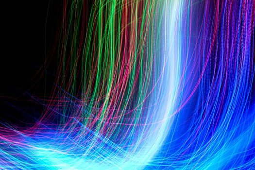 Abstract motion curved lights on dark background