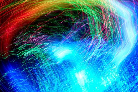 Abstract motion curved lights on dark background