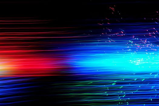 Abstract motion curved lights on dark background