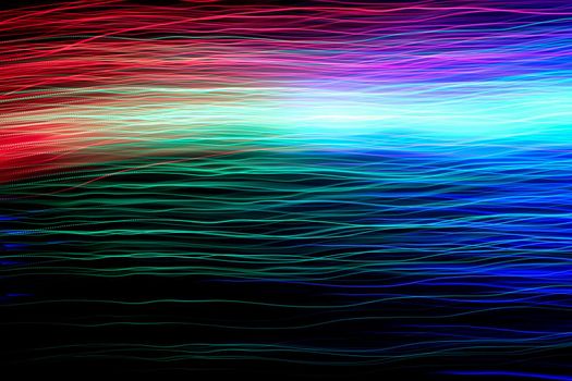 Abstract motion curved lights on dark background