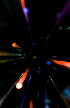 Abstract motion defocused lights on dark background