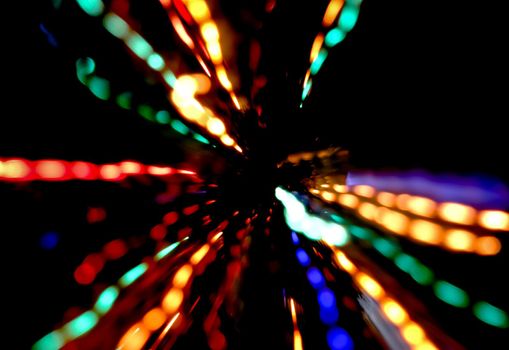 Abstract motion defocused lights on dark background