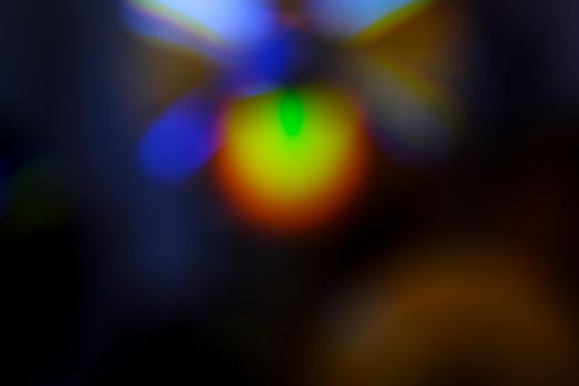 Abstract motion defocused lights on dark background