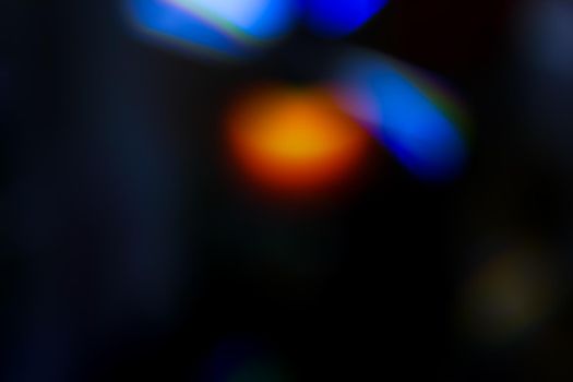 Abstract motion defocused lights on dark background