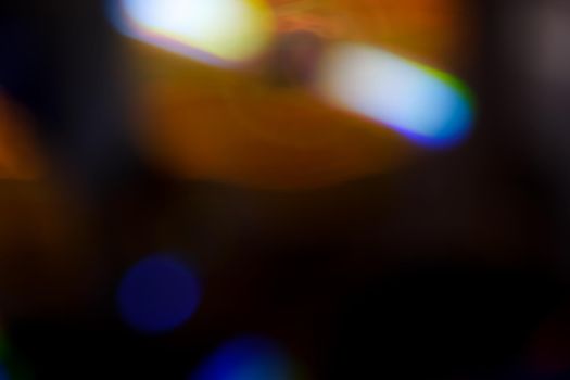 Abstract motion defocused lights on dark background