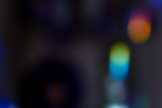 Abstract motion defocused lights on dark background