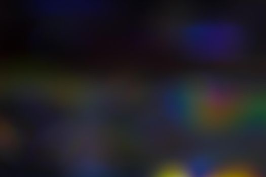 Abstract motion defocused lights on dark background