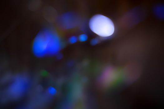 Abstract motion defocused lights on dark background