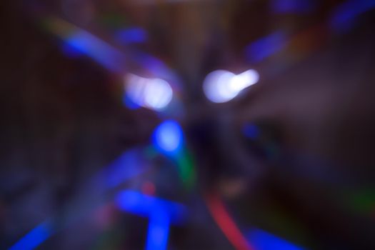 Abstract motion defocused lights on dark background