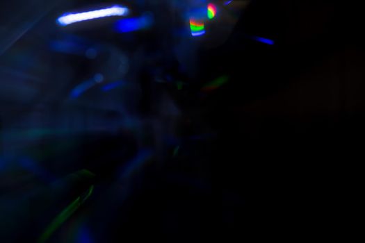 Abstract motion defocused lights on dark background