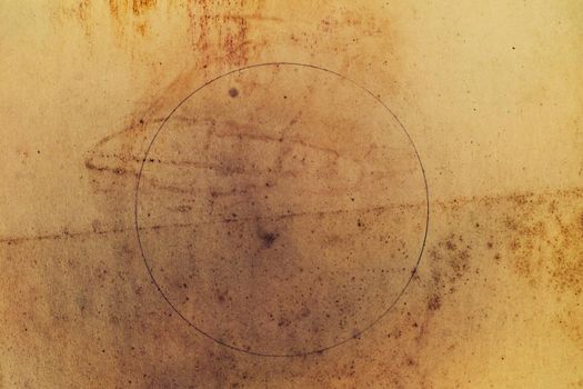 Aging, worn paper with water stains and rough edges