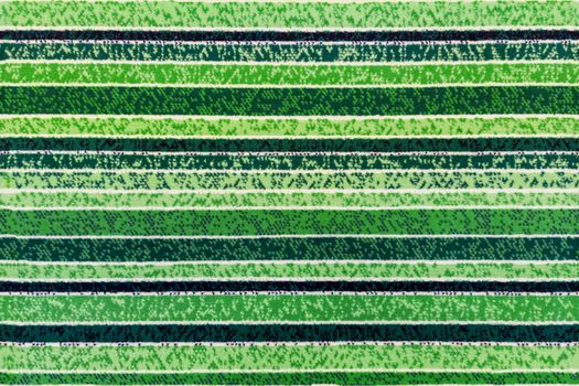 seamless texture of abstract green striped floor synthetic carpet surface