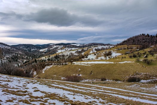 beautiful winter landscapes in the Romanian mountains, Fantanele village area, Sibiu county, Cindrel mountains, Romania