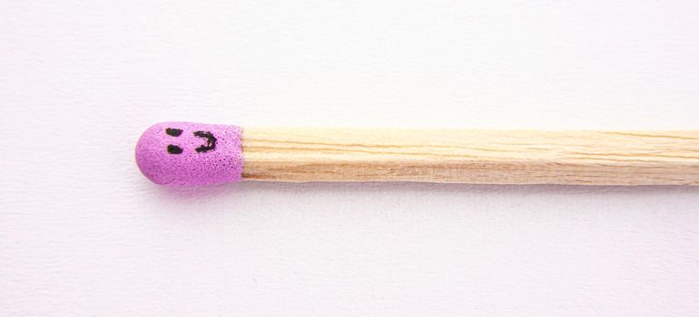 matchstick with faces painted on the heads