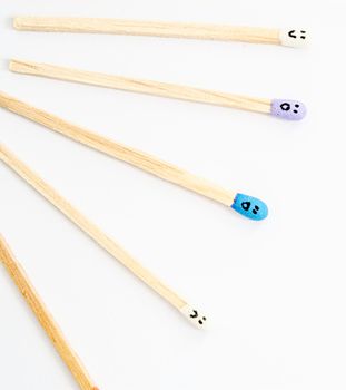 matchsticks with faces painted on the heads