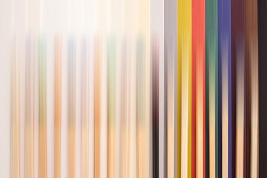 multicolored matchsticks on multicolored paper, motion blur