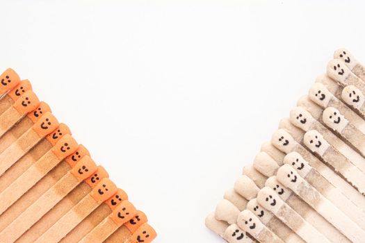 Multicolored matchsticks with faces painted on the heads