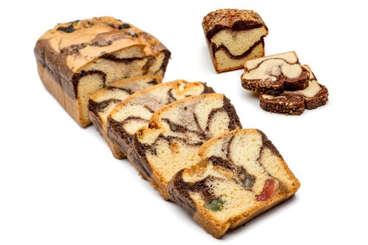 Slices of Romanian sponge cake with cocoa, turkish delight and raisins