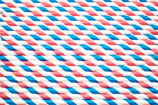 spiral striped drinking straws isolated on white background