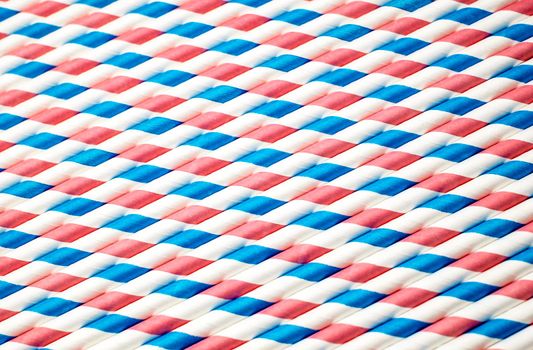 spiral striped drinking straws isolated on white background