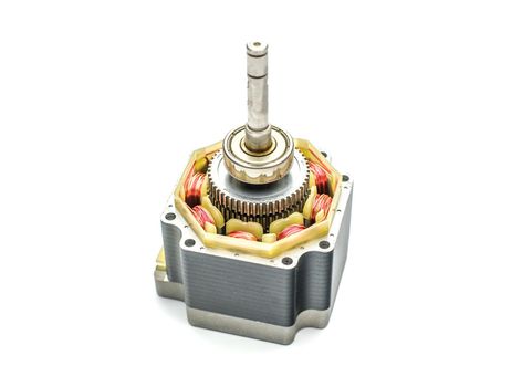 Stepper motor, disassembled, on white
