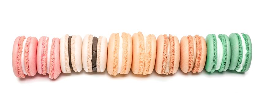 Sweet and colourful french macaroons or macaron on white background