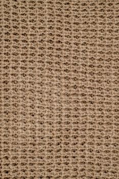 The texture of a knitted woolen fabric