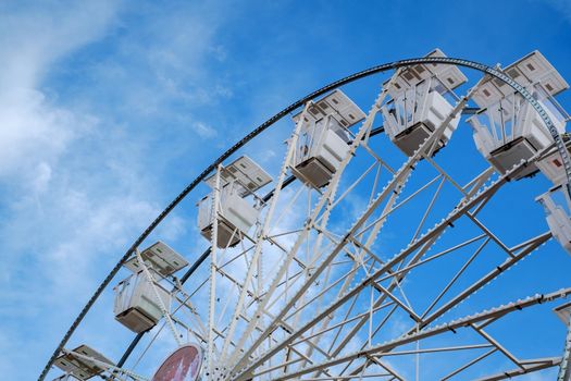 view of the ferris wheel on blue sky