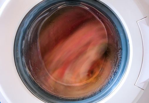 Washing machine with dirty clothes inside